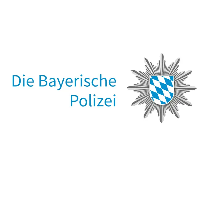Schriftzug Bayerische Polizei und Logo der Polizei mit einem Stern und bayerischem Wappen
